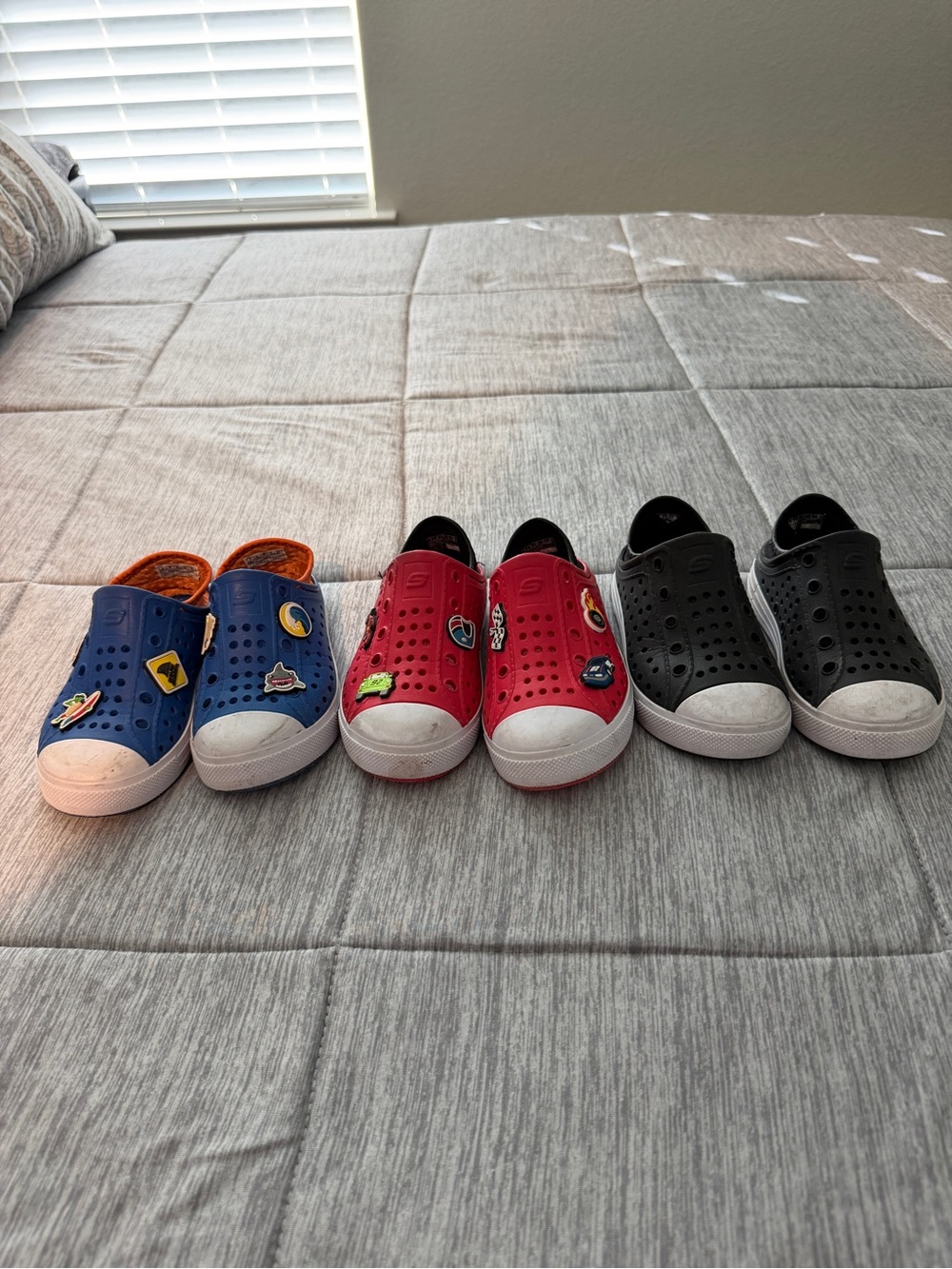 Sketchers Slip-On Kids Shoes in Blue, Red, and Black